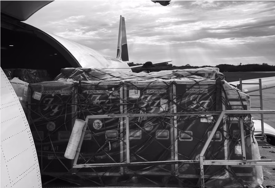 Foo Fighters flight cases being loaded into a cargo plane